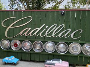 Denis Bulloch Cadillac font on fence