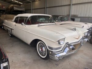 Fri 10th Bob amazing 57 Caddy convertible in white w Ford Plexy top next door 6-volt